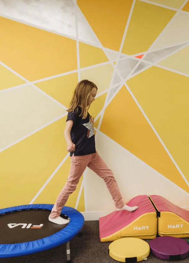 - A child using an obstacle course during a speech pathology session