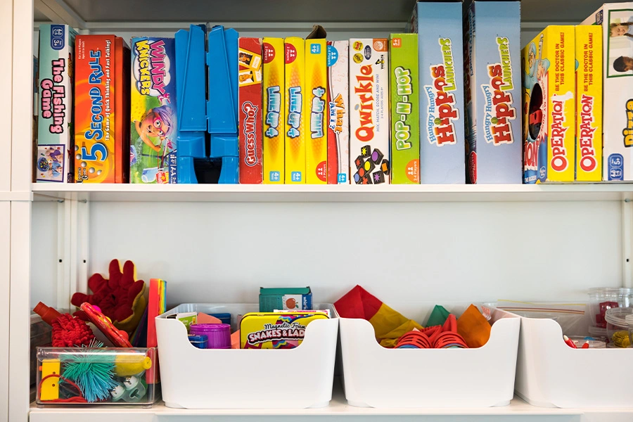 - Speech pathologist using action based play to engage client in speech therapy session